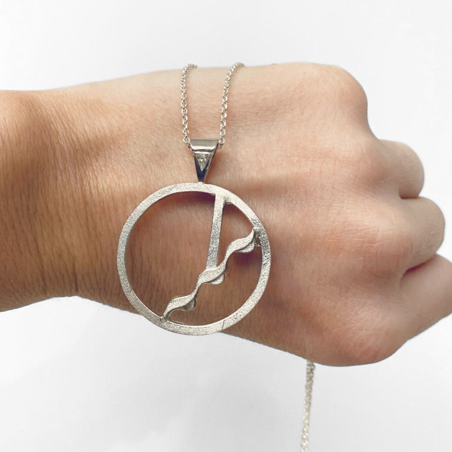 One of a Kind: (No. 14) Bespoke Silver Glissando pendant with Triangular Diamond