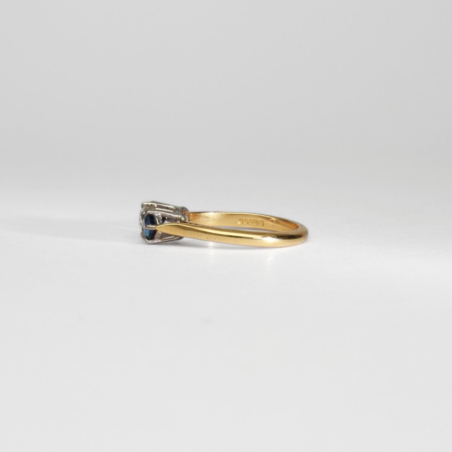 18ct gold ring with blue sapphires and diamond by Duncan Eves
