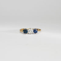 18ct gold ring with blue sapphires and diamond by Duncan Eves