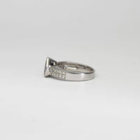 18ct white gold ring with teardrop tanzanite and diamonds by Duncan Eves