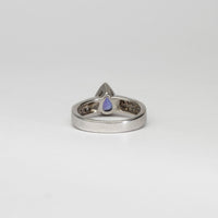 18ct white gold ring with teardrop tanzanite and diamonds by Duncan Eves