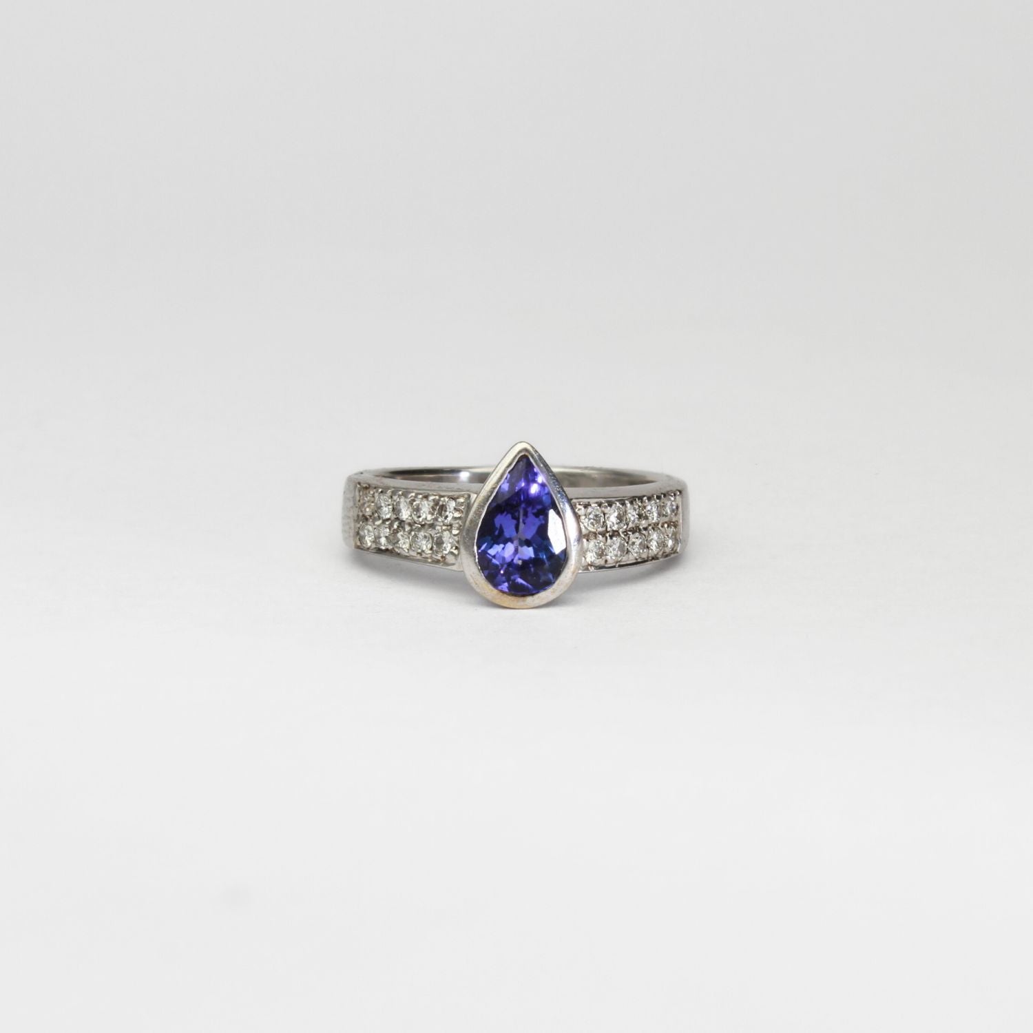 18ct white gold ring with teardrop tanzanite and diamonds by Duncan Eves