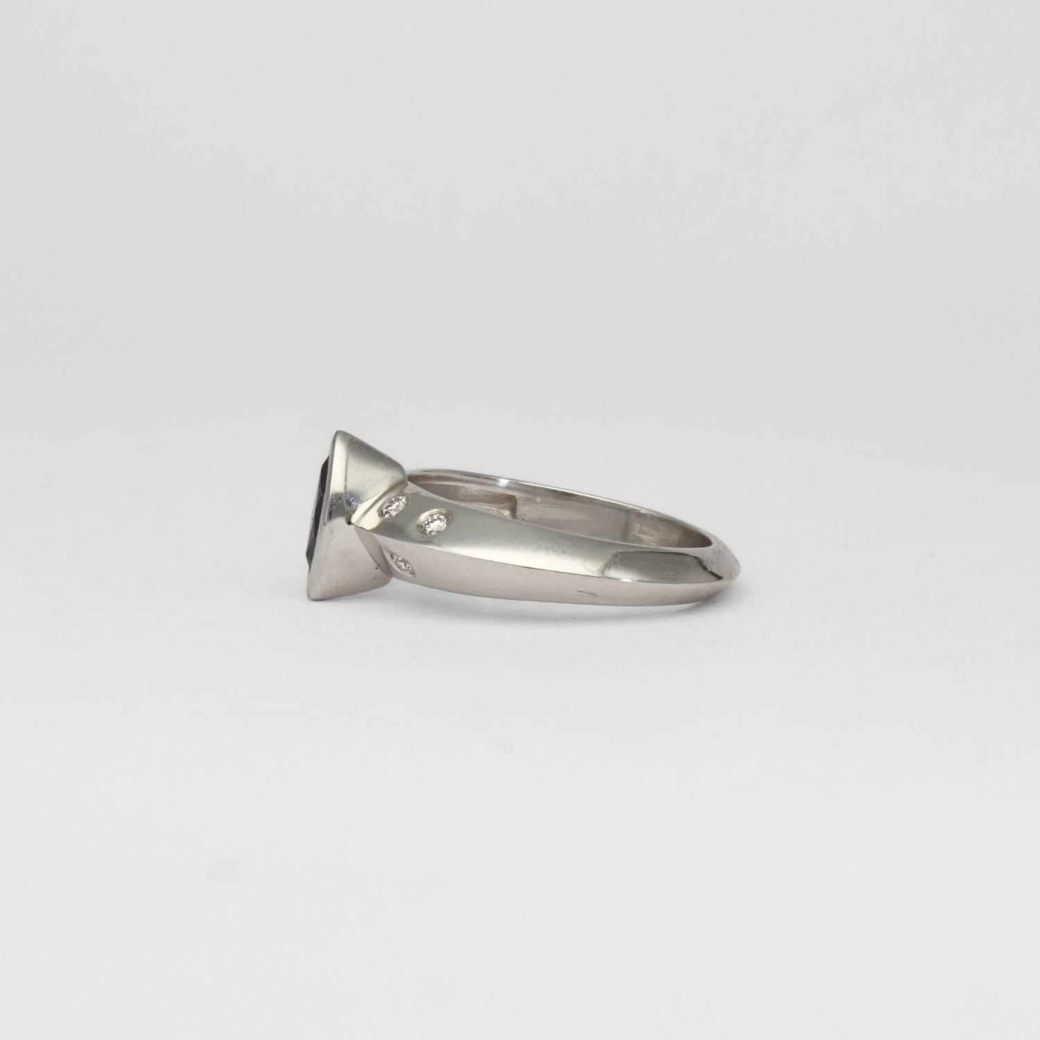 18ct white gold ring with marquise sapphire and diamonds by Duncan Eves