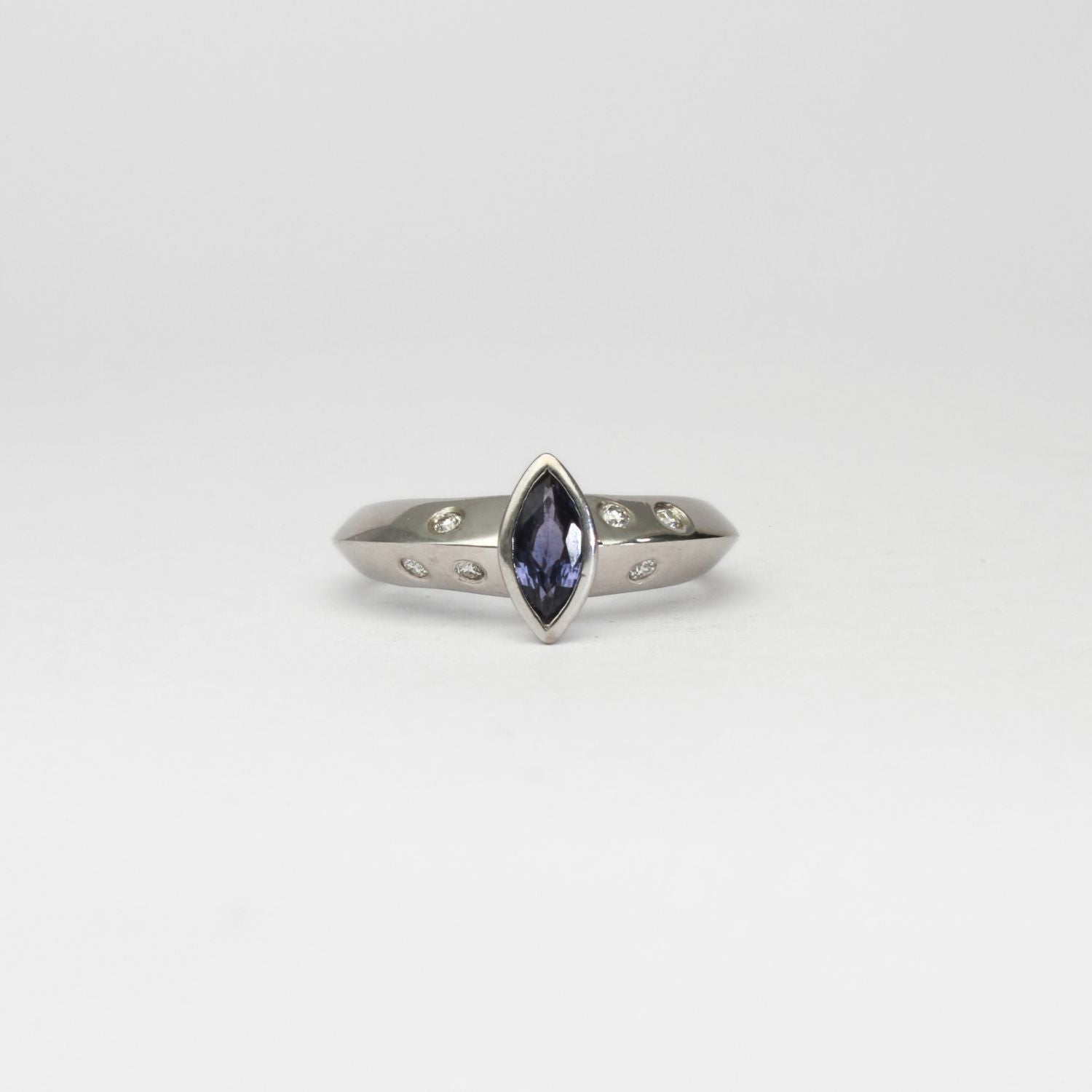 18ct white gold ring with marquise sapphire and diamonds by Duncan Eves