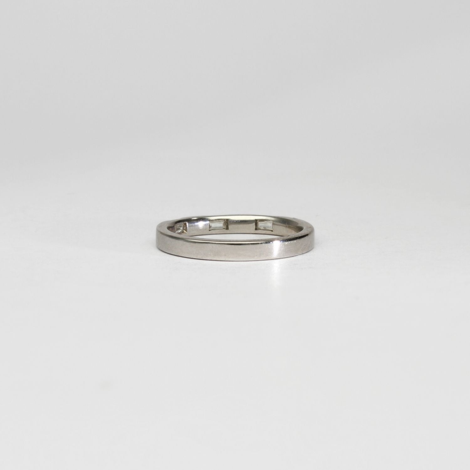 Platinum ring with 3 baguette diamonds by Duncan Eves