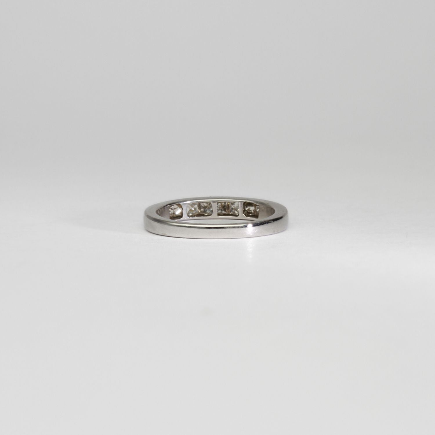 18ct white gold ring with 8 princess cut diamonds by Duncan Eves