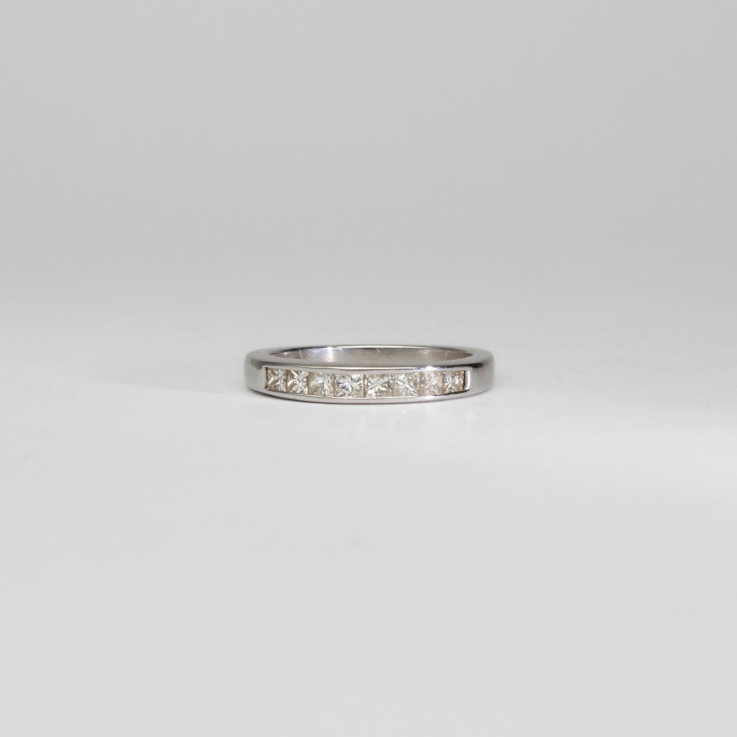 18ct white gold ring with 8 princess cut diamonds by Duncan Eves