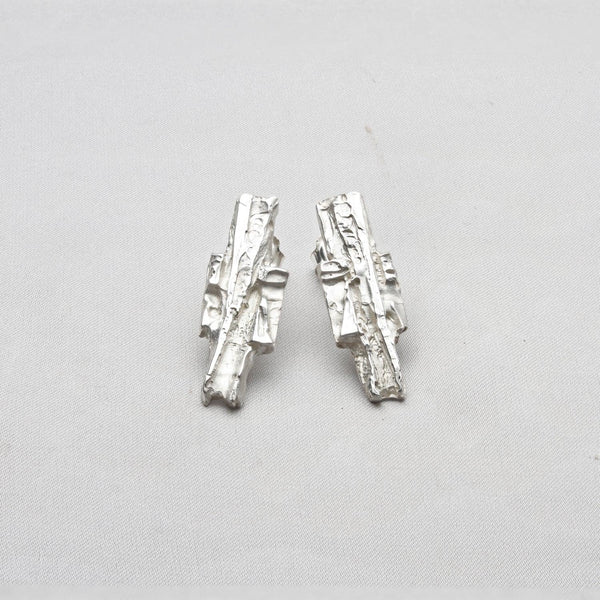 Contemporary Welsh silver jewellery. Inspired by the beautiful landscape of Wales. These textured earrings are designed and handmade in Wales