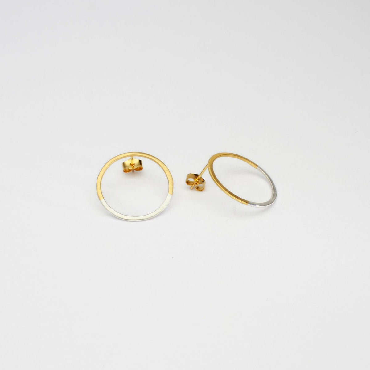 Circle 2 tone studs silver with 22ct gold plating by Charlotte Reid