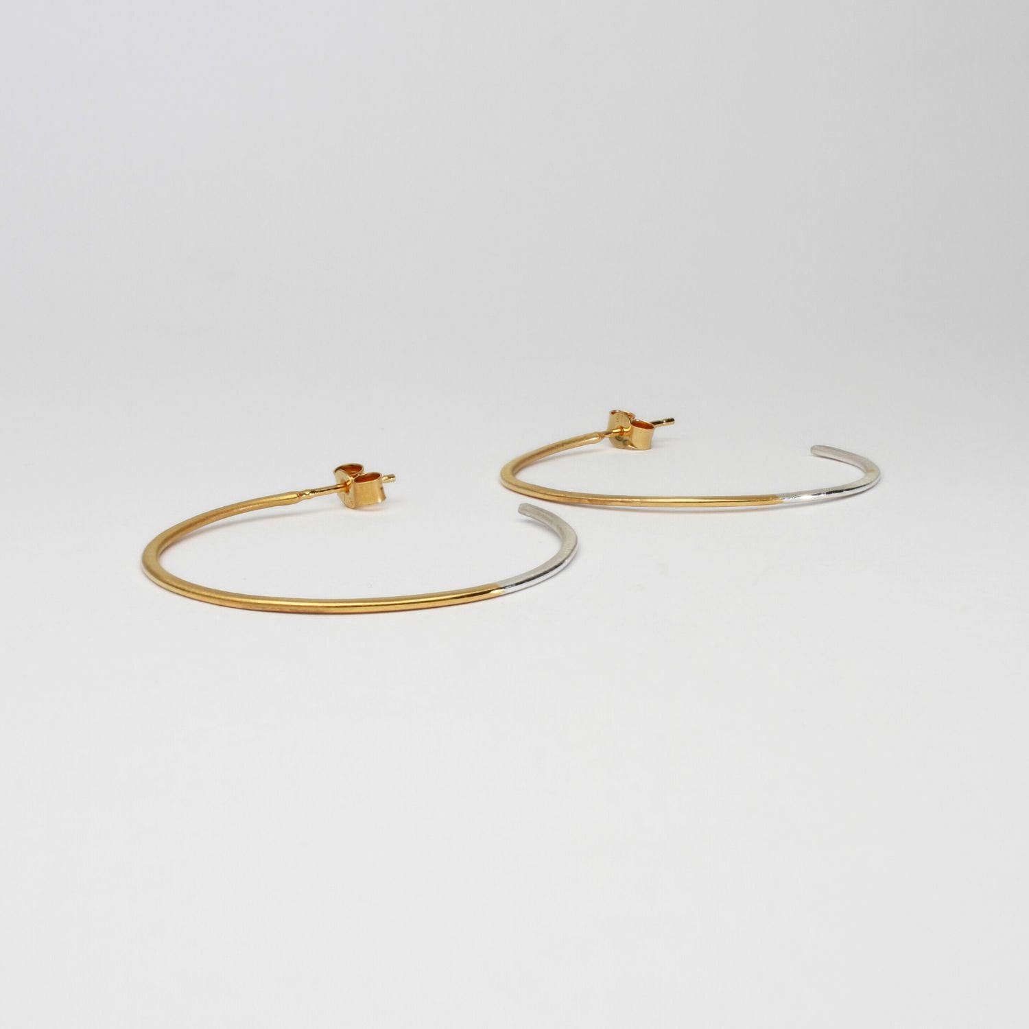 2 tone hoops silver with gold plating hoops by Charlotte Reid