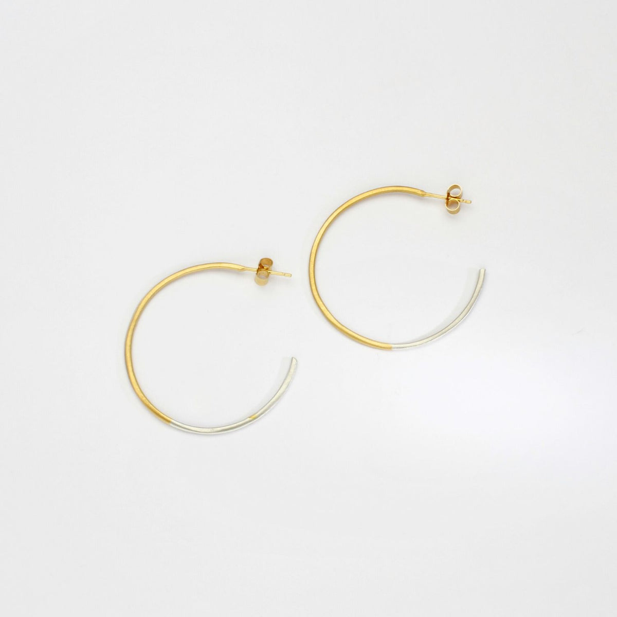 2 tone hoops silver with gold plating hoops by Charlotte Reid
