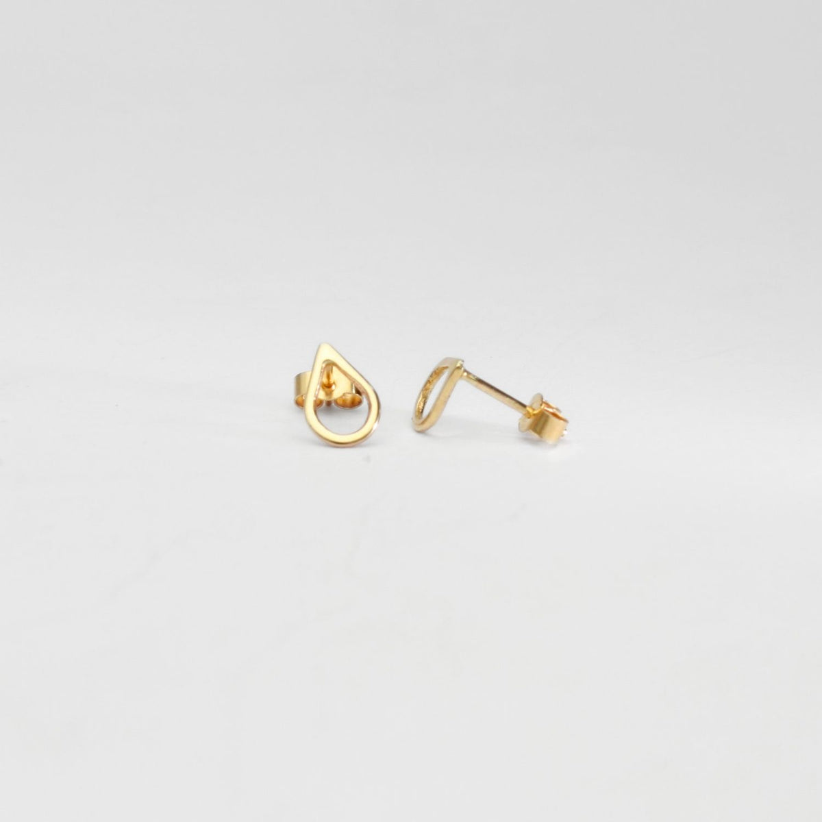 9ct gold tiny raindrop studs by Kate Wimbush