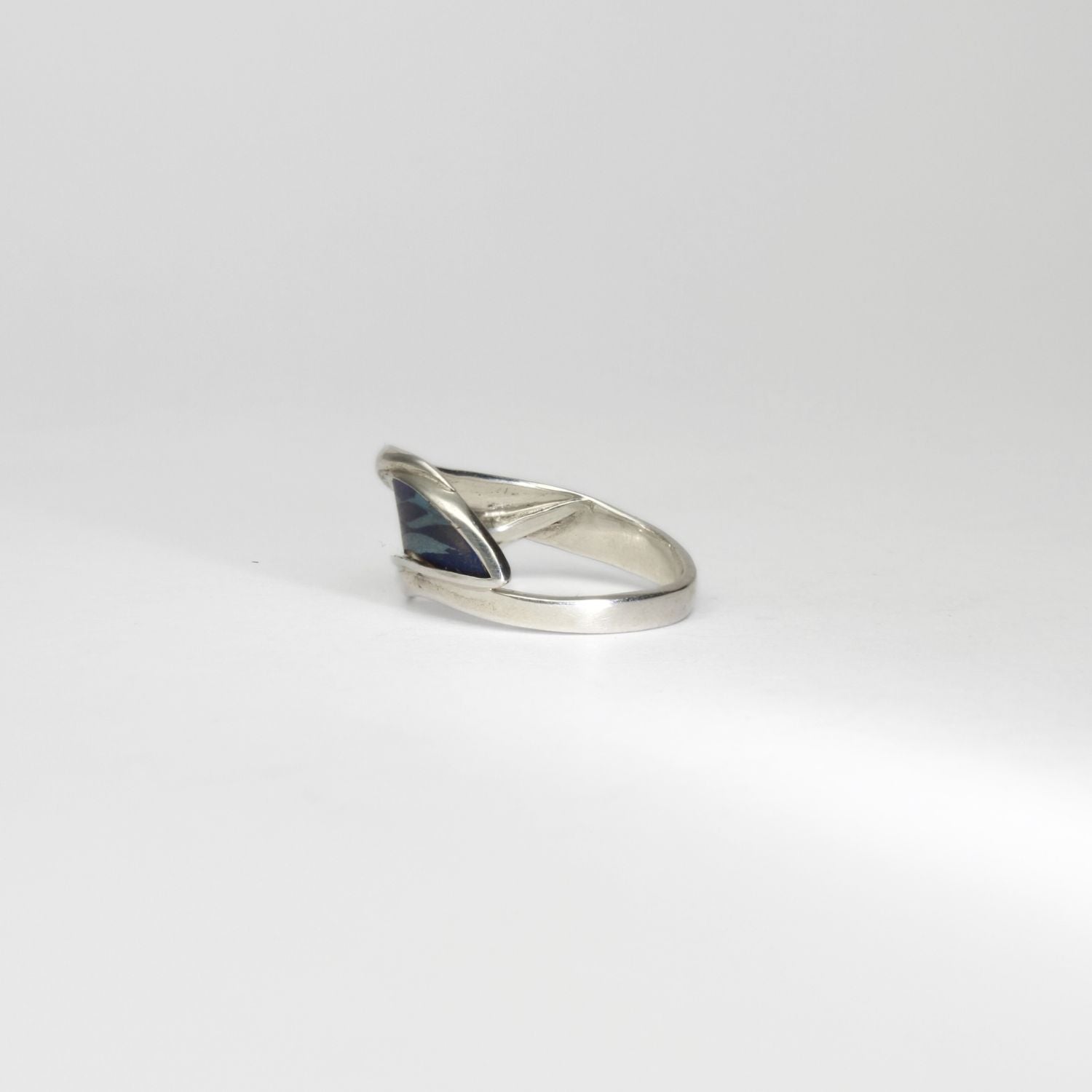 Niobium, silver & gold ring by Brian Eburah