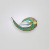 Brooch - feather niobium, silver & 18ct gold with peridot brooch by Brian Eburah