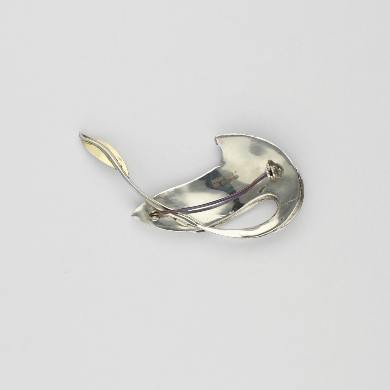 Brooch - titanium, silver & 18ct gold with blue topaz brooch by Brian Eburah