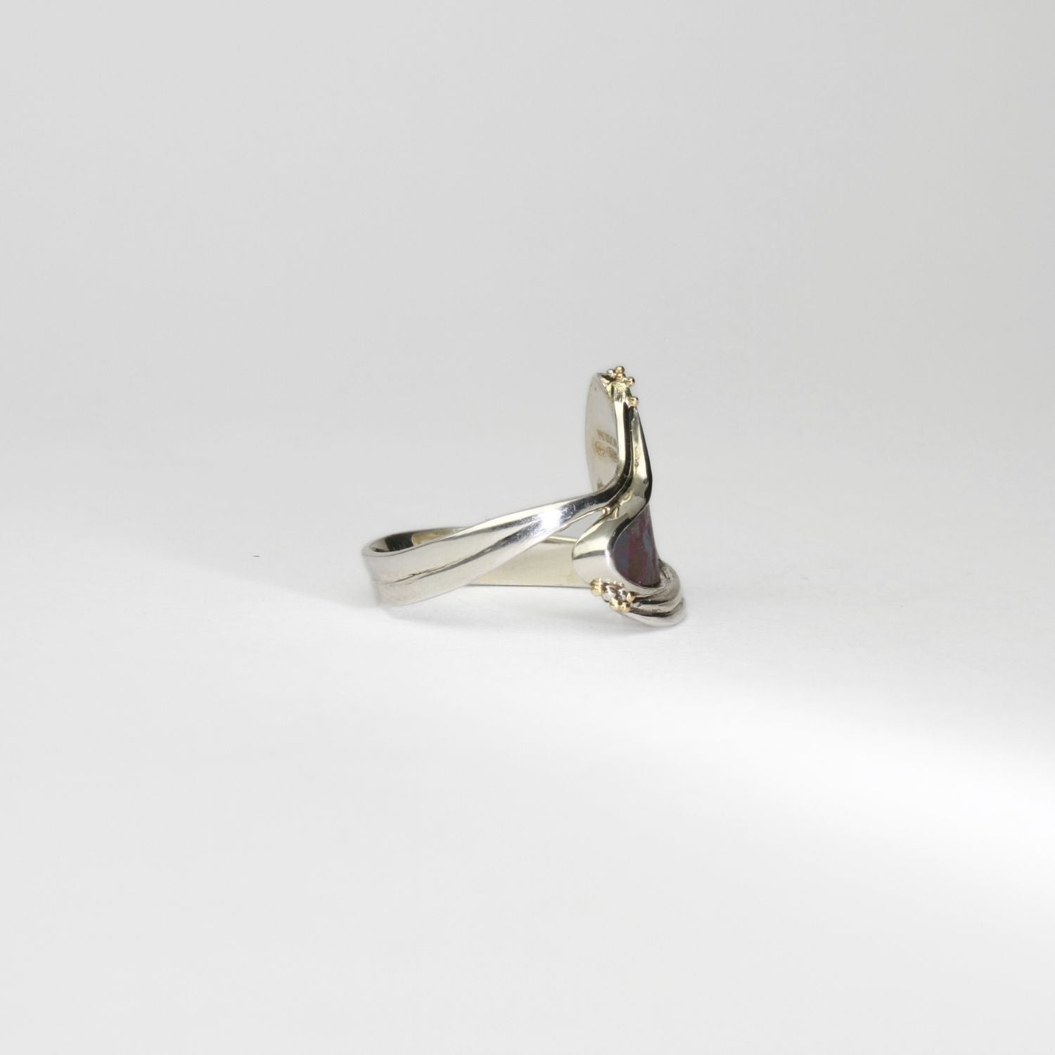 Niobium, silver & gold ring by Brian Eburah
