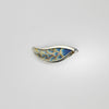 Brooch - niobium & silver by Brian Eburah