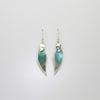 Earrings - floating niobium & silver hook earrings by Brian Eburah