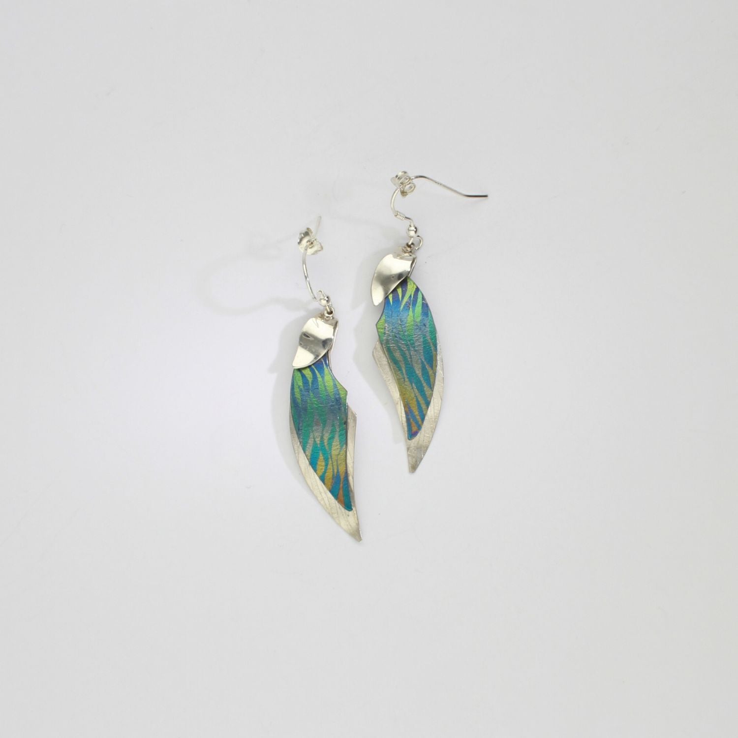 Earrings - floating niobium & silver hook earrings by Brian Eburah