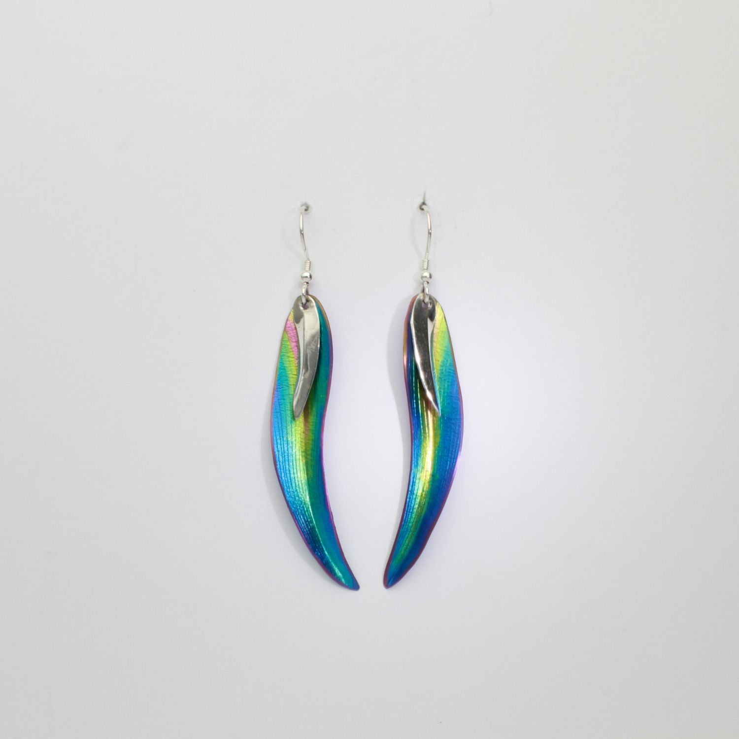 Earrings - poppy/daisy niobium & silver hook earrings by Brian Eburah