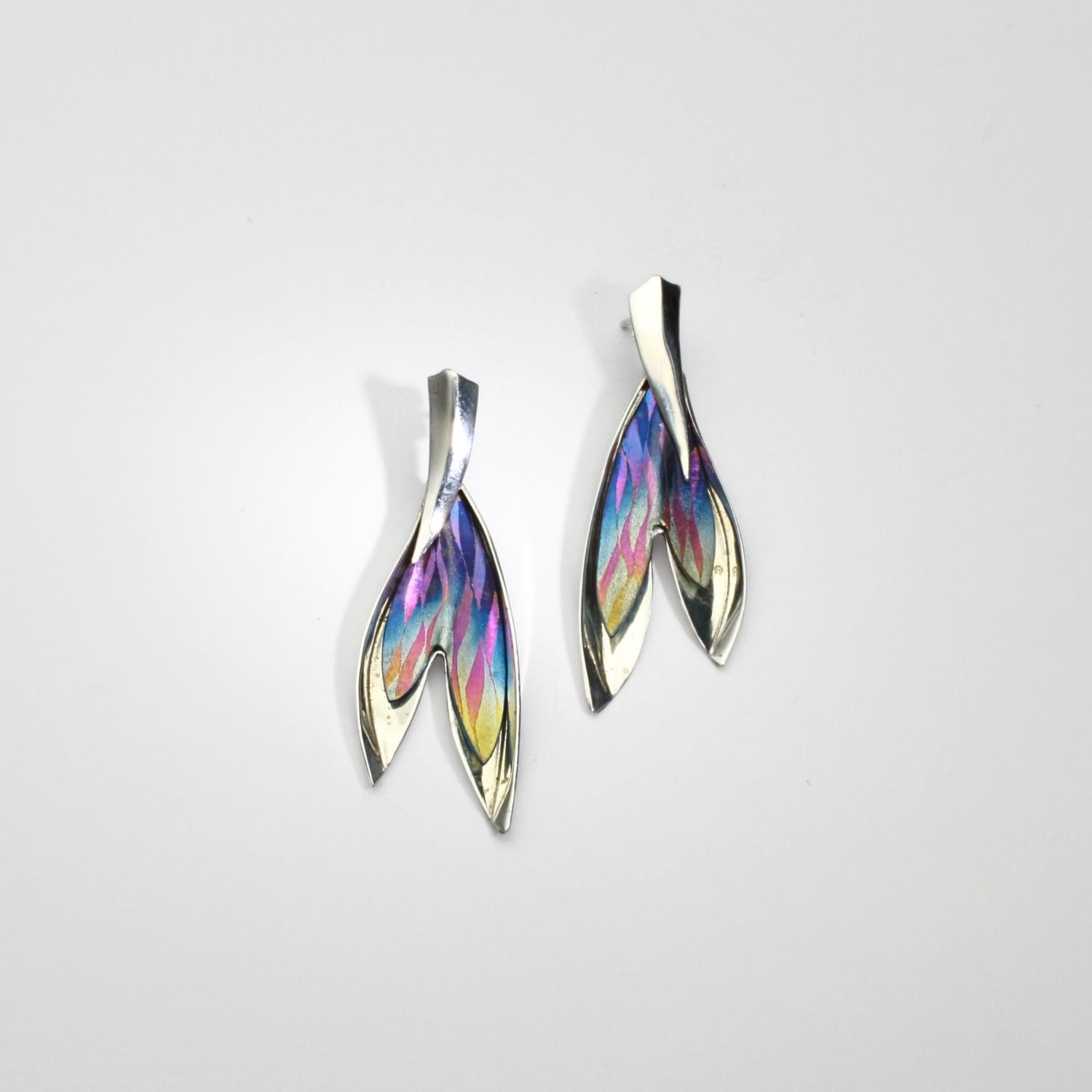Earrings - Niobium & silver stud earrings by Brian Eburah