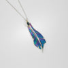 Pendant - feather niobium, silver & 18ct gold pendant with blue topaz by Brian Eburah