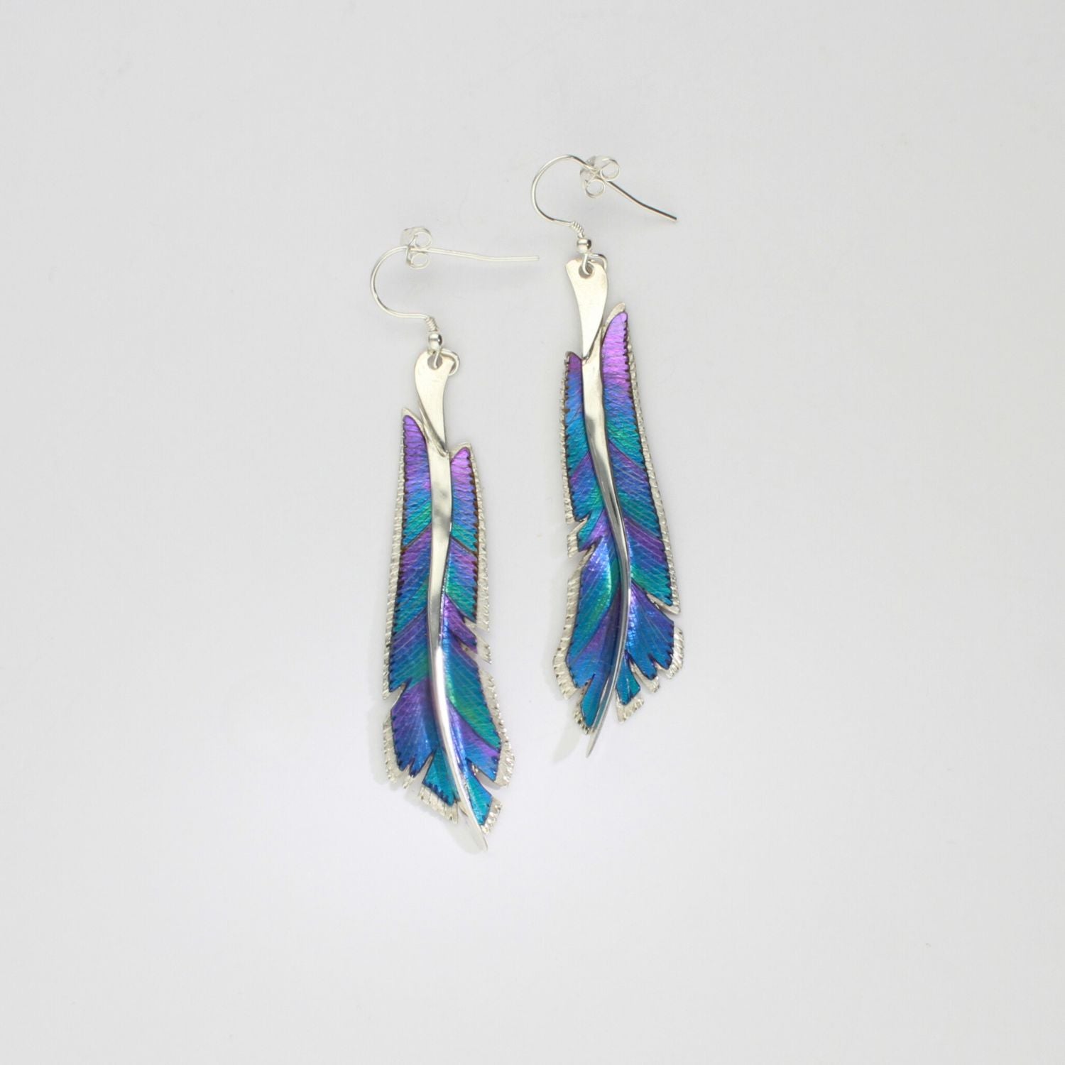 Earrings - feather niobium & silver hook earrings by Brian Eburah