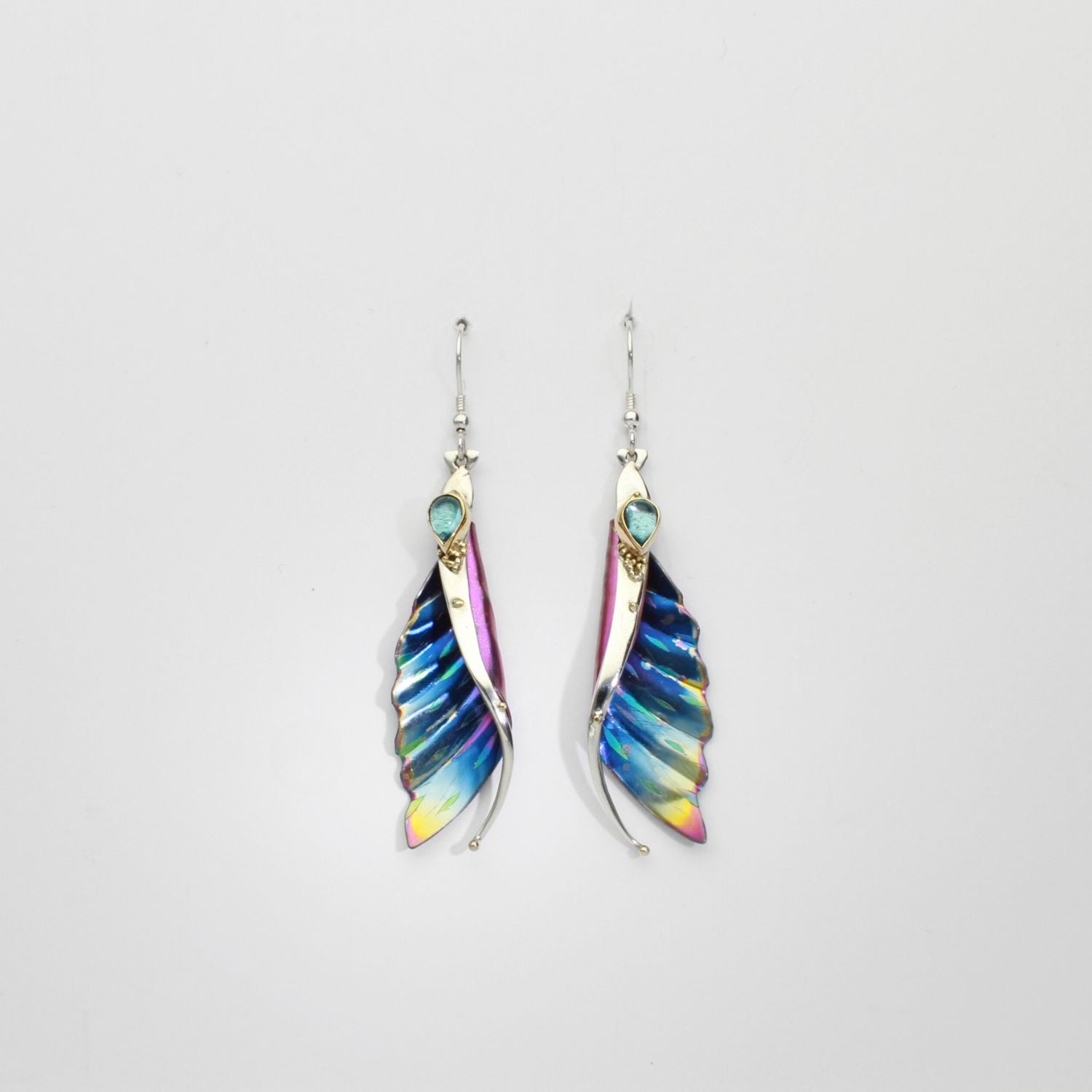 Earrings - wave niobium, silver & 18ct gold with blue topaz hook earrings by Brian Eburah
