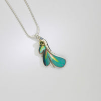 Pendant - poppy/daisy niobium, silver & 18ct gold pendant with peridot by Brian Eburah
