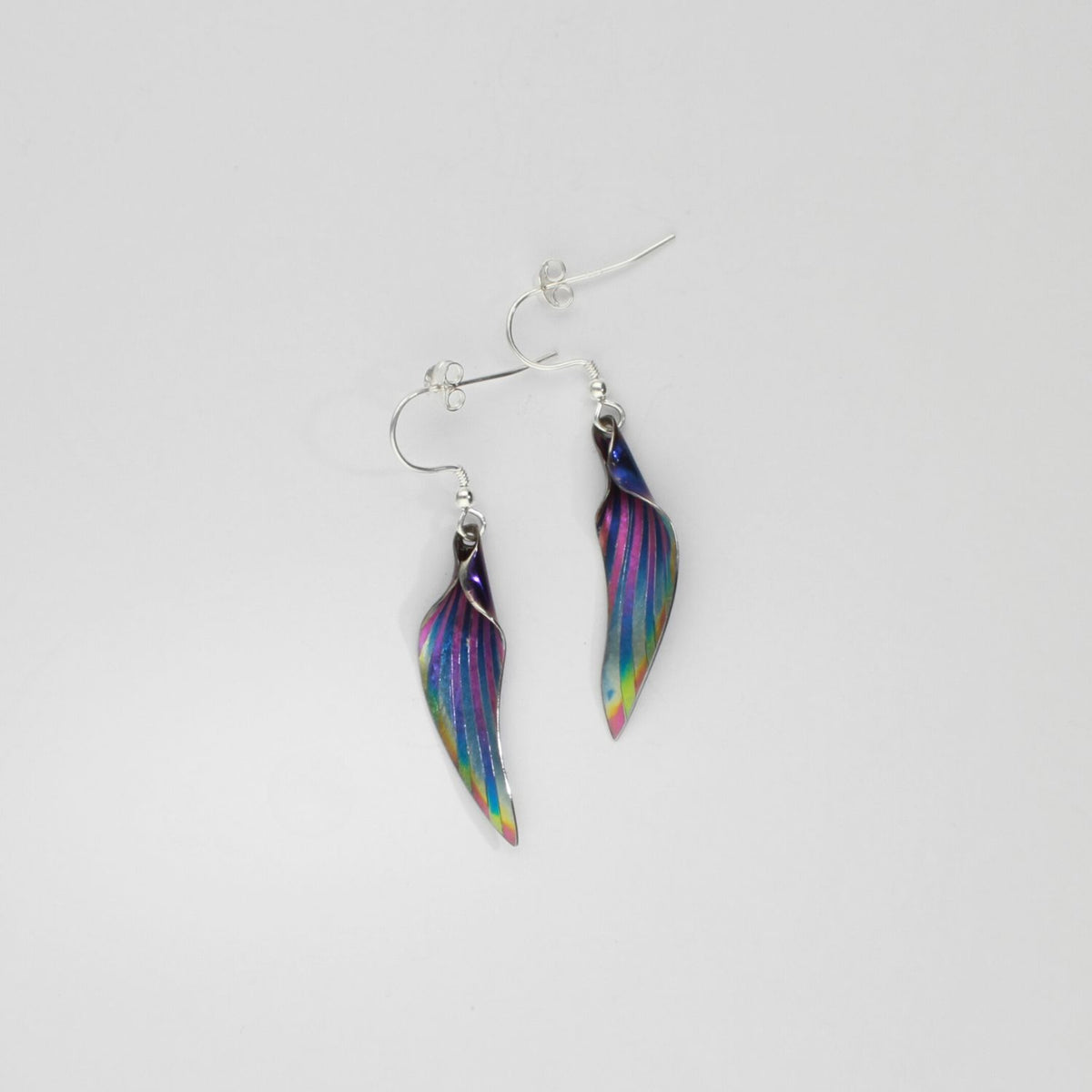 Earrings - niobium & silver hook earrings by Brian Eburah