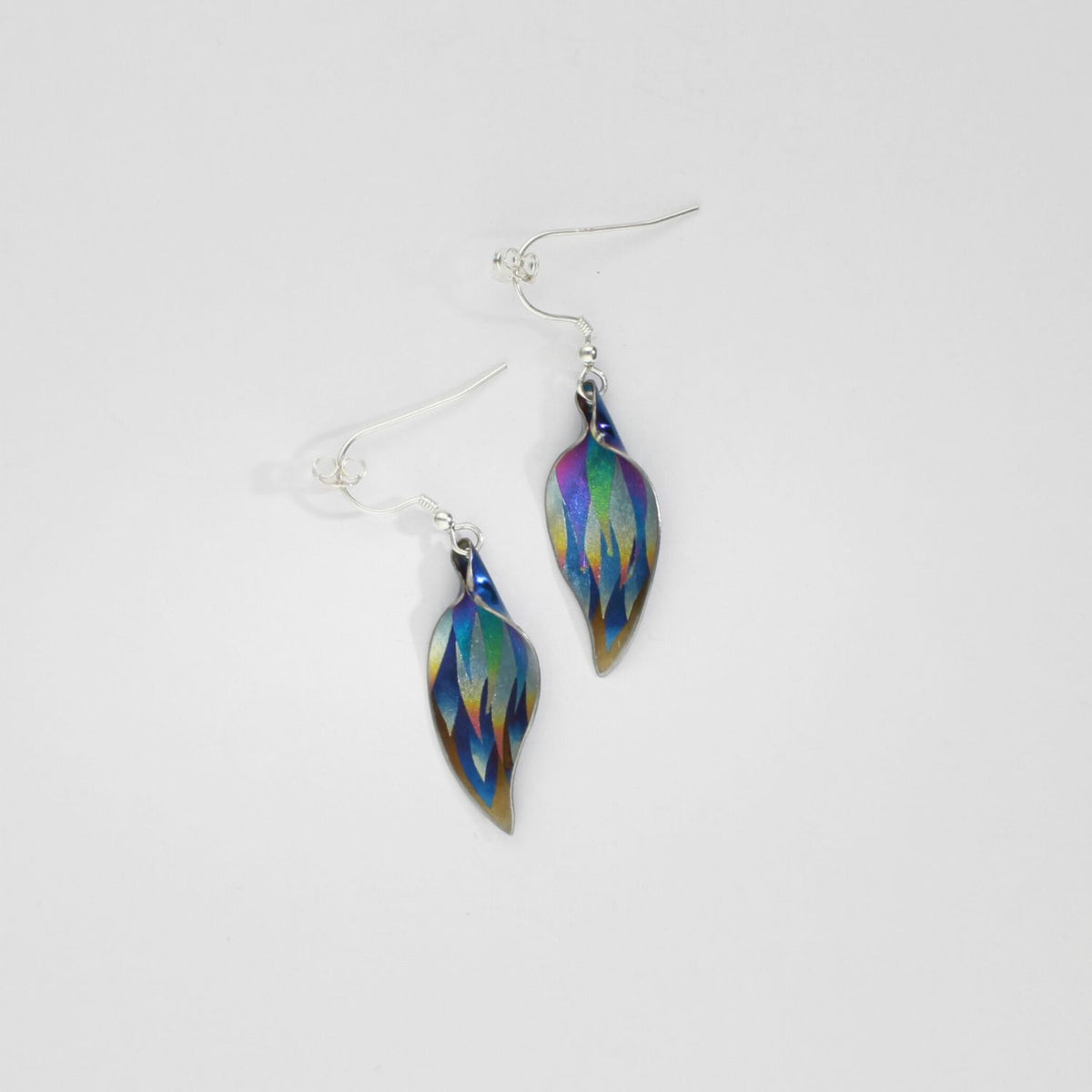 Earrings - niobium & silver hook earrings by Brian Eburah