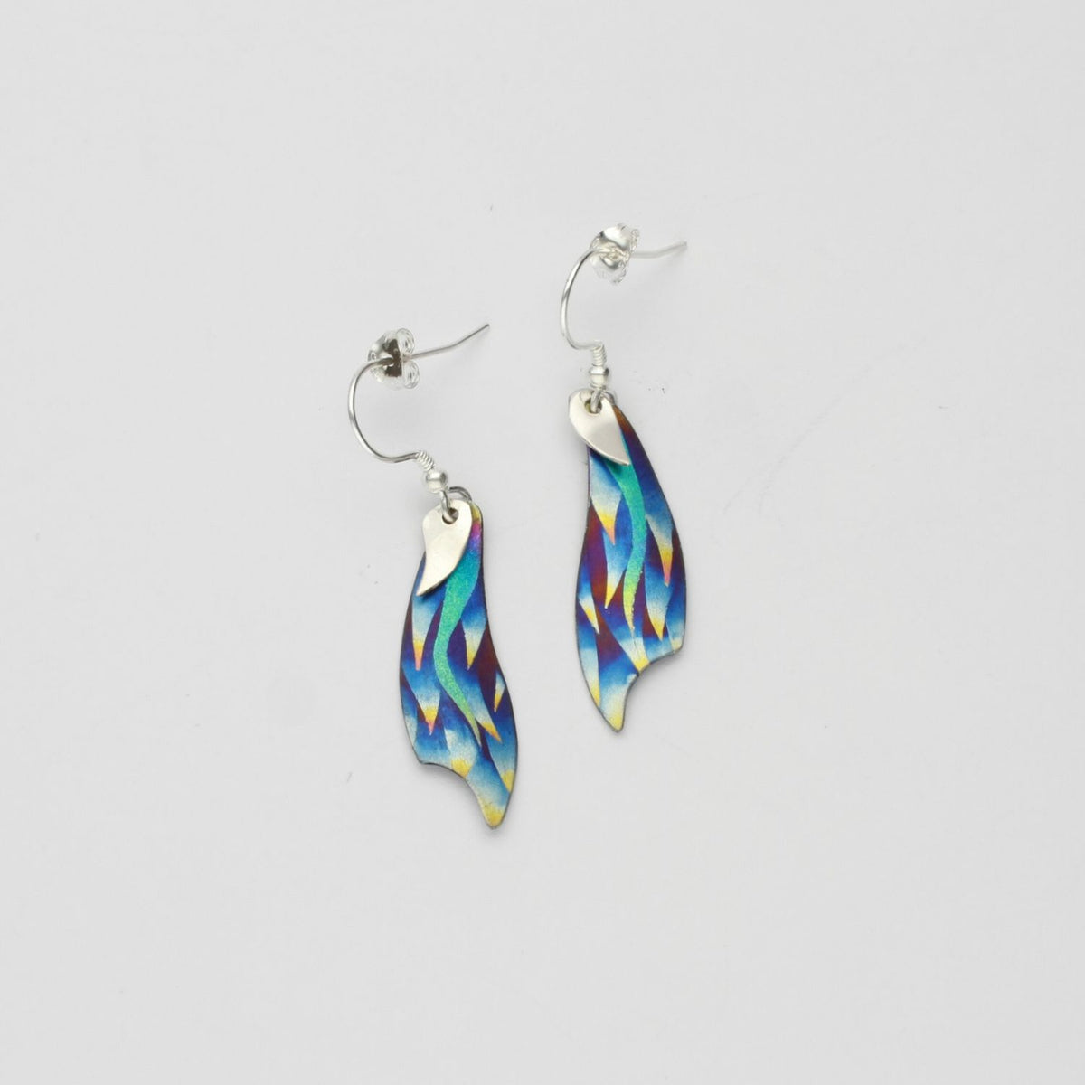 Earrings - niobium & silver hook earrings by Brian Eburah