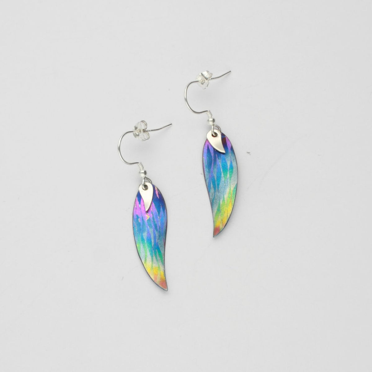Earrings - niobium & silver hook earrings by Brian Eburah
