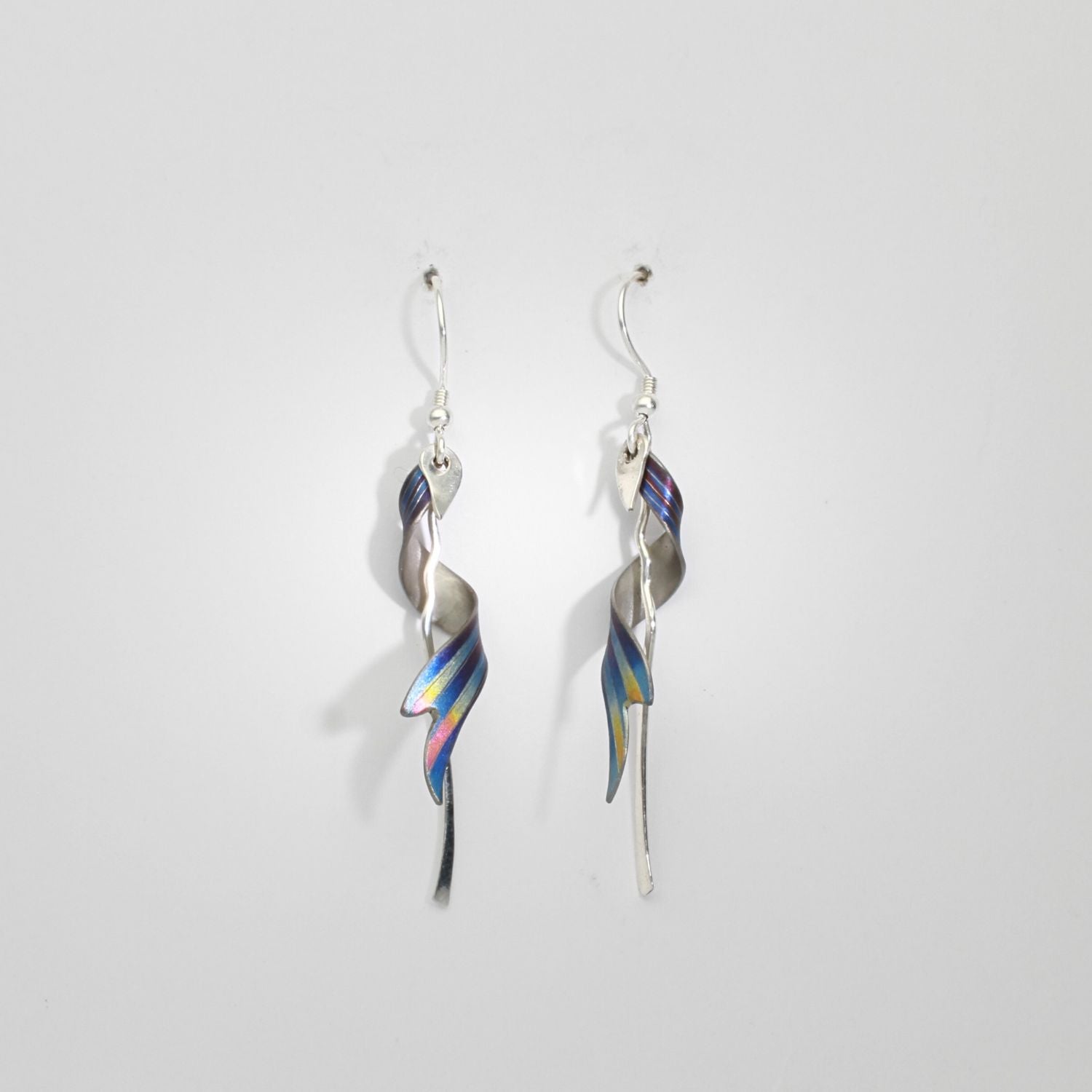 Niobium & silver drop earrings by Brian Eburah
