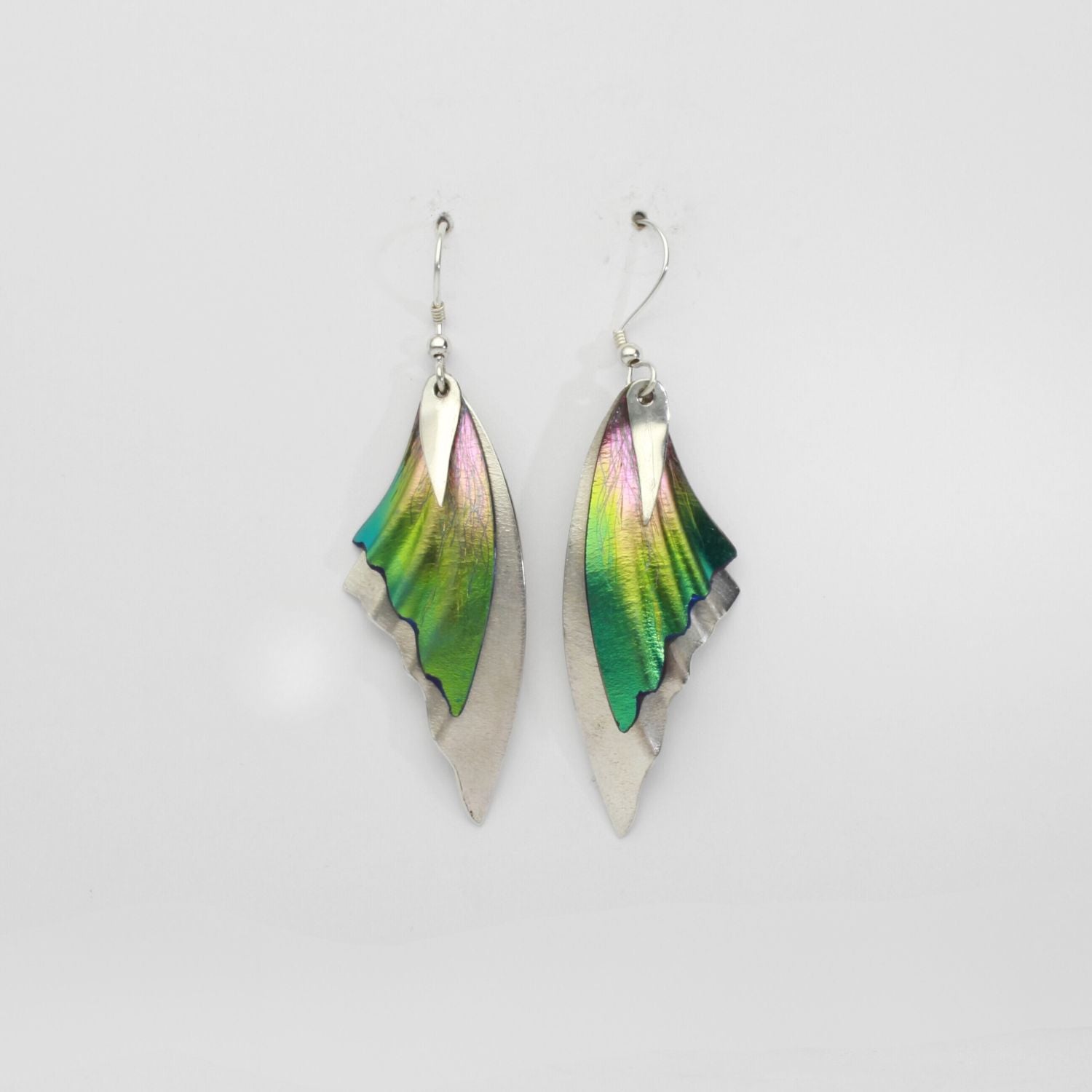 Silver and niobium earrings by Brian Eburah