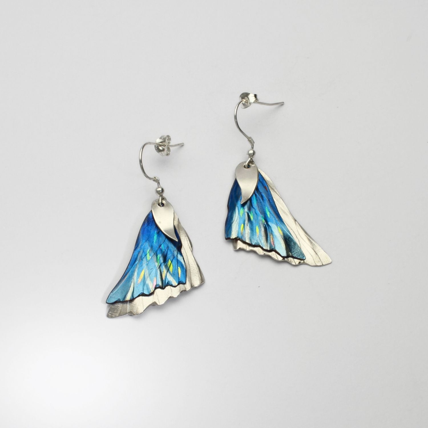 Niobium & silver hook earrings by Brian Eburah