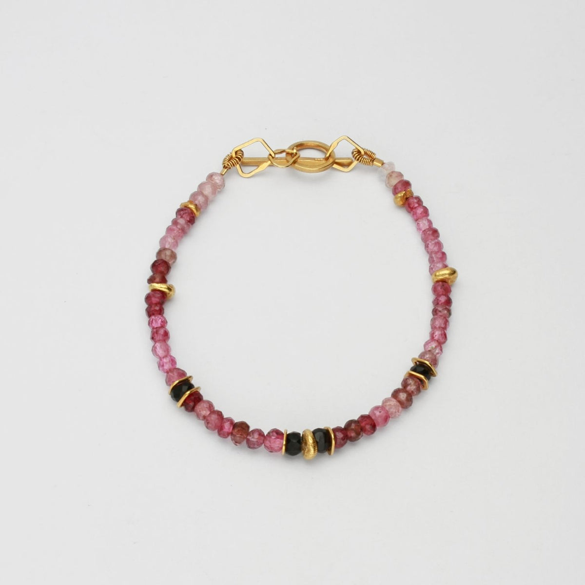 Indian summer beaded gold plated bracelet with pink & black tourmalines by Bea Jareno