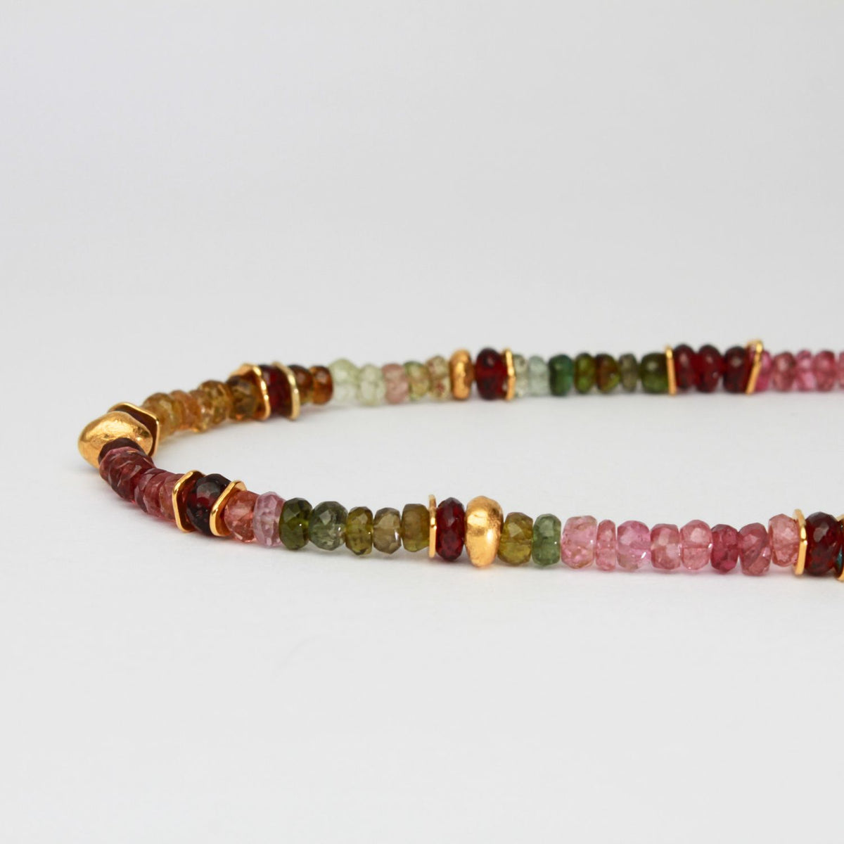 Indian summer beaded necklace with 24kt gold plating, tourmalines & red mozambique garnet details  by Bea Jareno