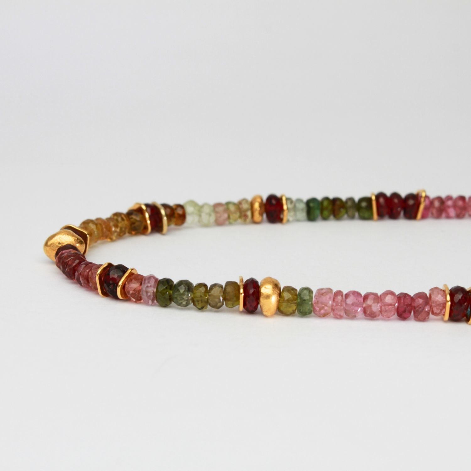 Indian summer beaded necklace with 24kt gold plating, tourmalines & red mozambique garnet details  by Bea Jareno