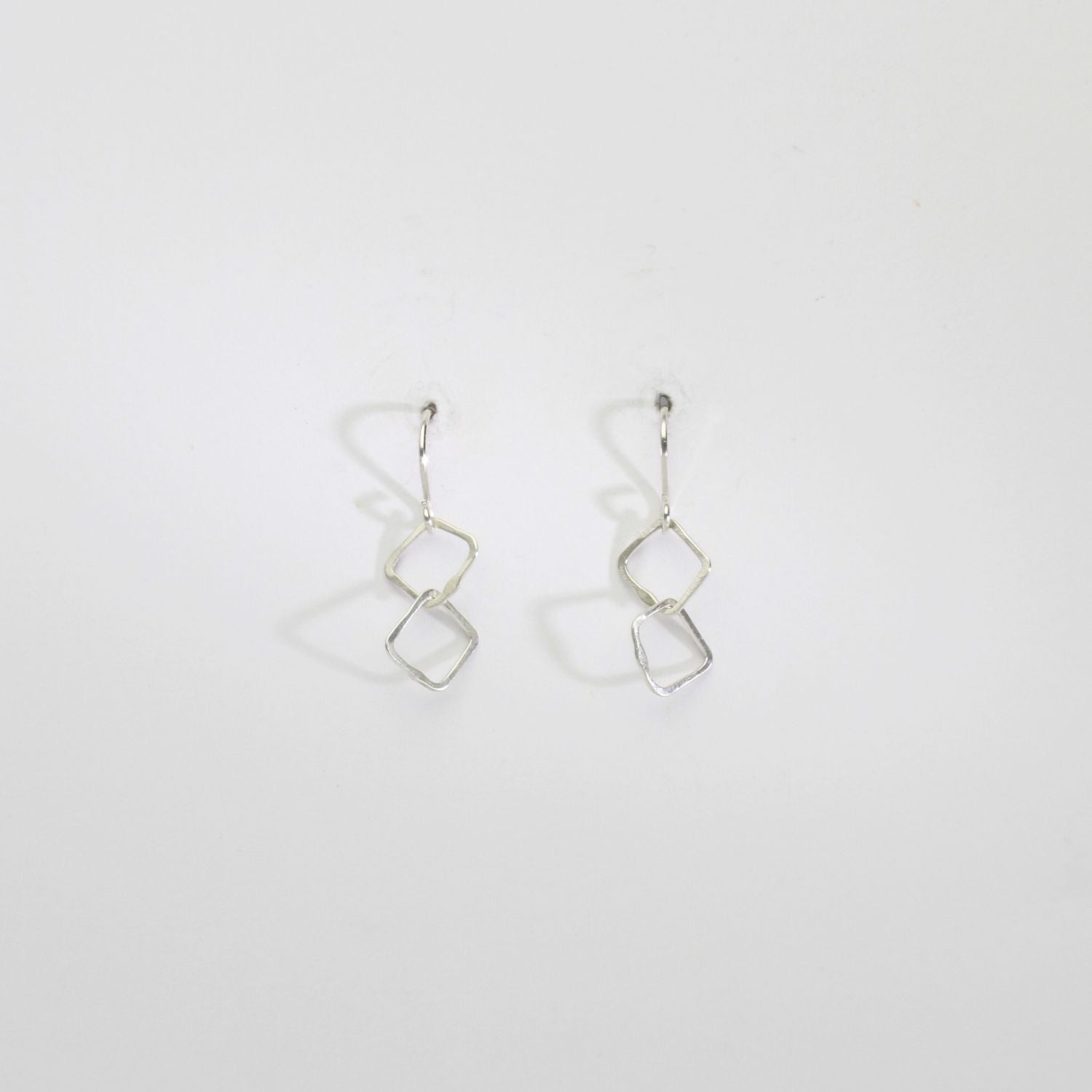 2 irregular link silver hook earrings by Bea Jareno