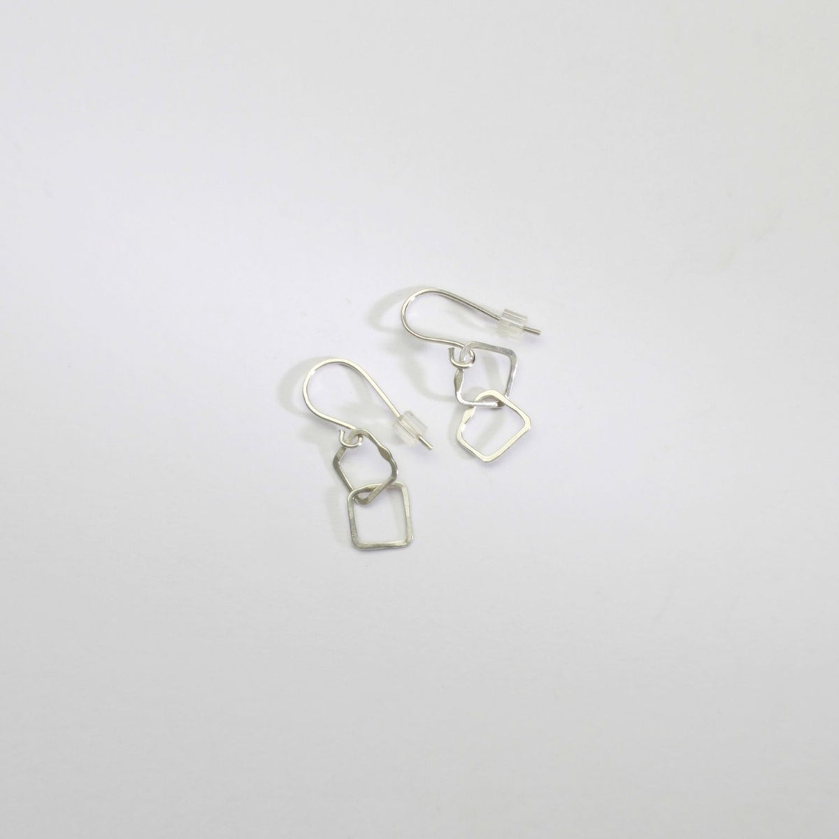 2 irregular link silver hook earrings by Bea Jareno