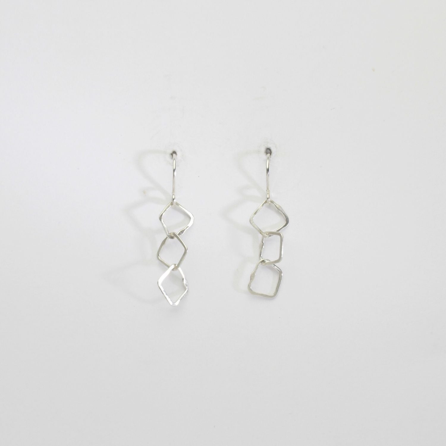 3 irregular link silver hook earrings by Bea Jareno