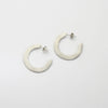 Large silver hoops by Bea Jareno