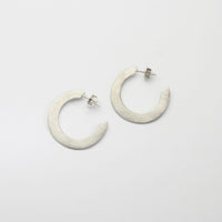 Large silver hoops by Bea Jareno