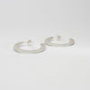 Large silver hoops by Bea Jareno