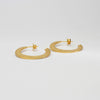 Large silver 24kt gold plated hoops by Bea Jareno