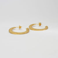 Large silver 24kt gold plated hoops by Bea Jareno