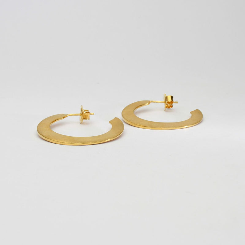 Large silver 24kt gold plated hoops by Bea Jareno