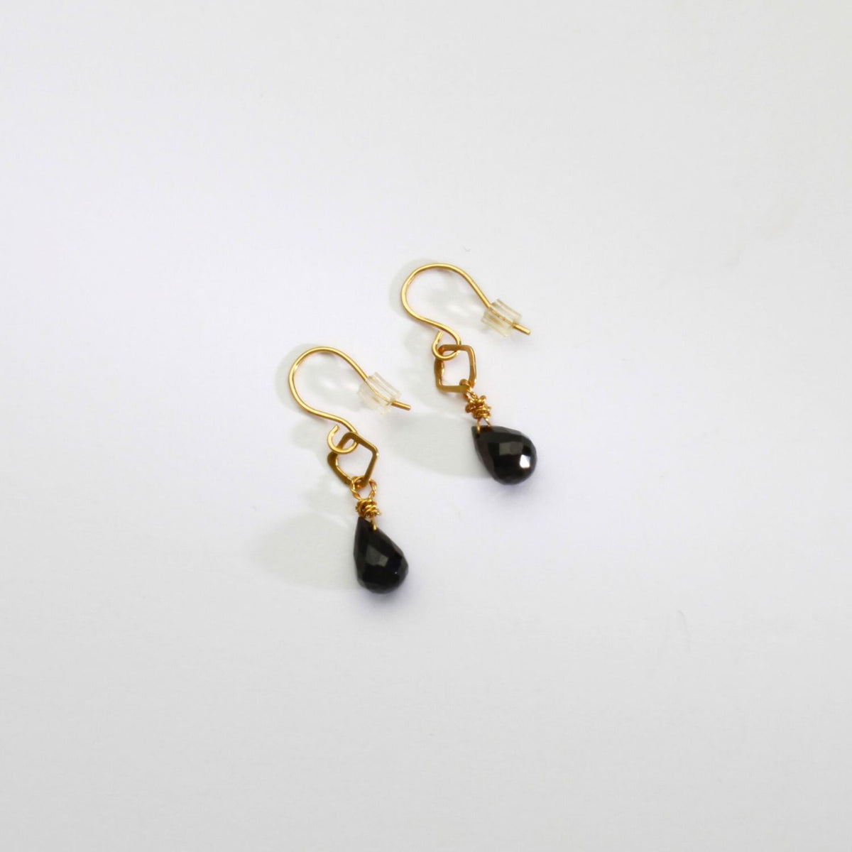 Black spinal silver 24kt gold plated hook earrings by Bea Jareno