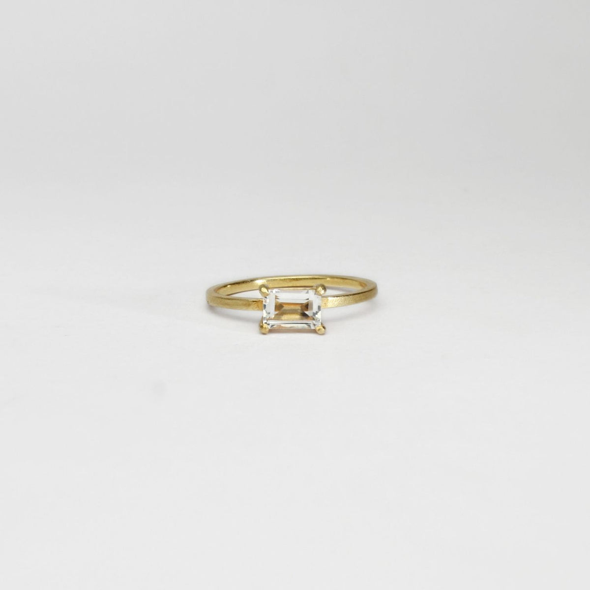 Delicate single white topaz ring by Bea Jareno
